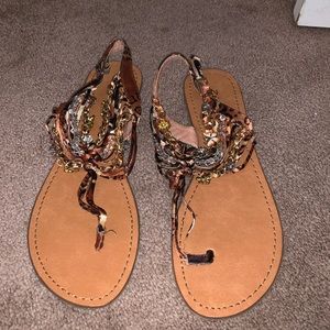 Zigisoho sandals with cheetah and metal details